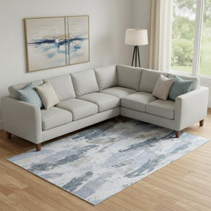 HomeRoots 9' X 12' Sky Blue Gray Ivory Washable Area Rug with UV Protection for Modern Spaces and Easy Care 694663