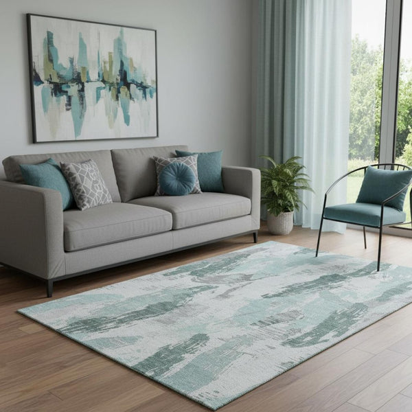 HomeRoots 5' X 8' Teal Ivory Gray Abstract Area Rug – Washable, UV Protected for High-Traffic Homes & Style 694666