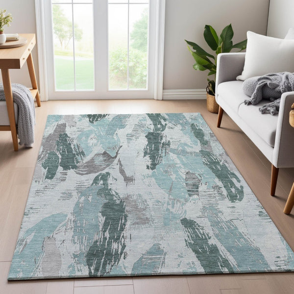 HomeRoots 5' X 8' Teal Ivory Gray Abstract Area Rug – Washable, UV Protected for High-Traffic Homes & Style 694666