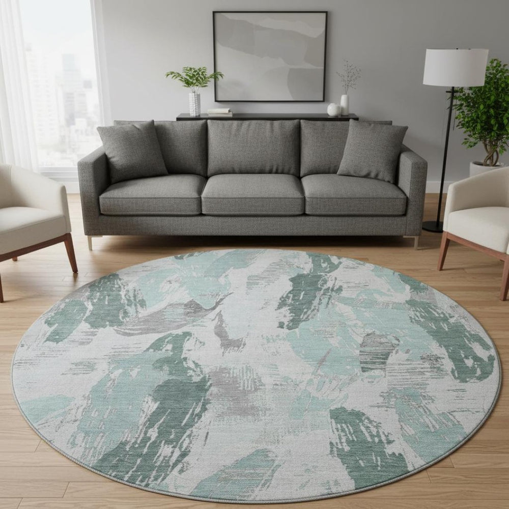 HomeRoots 8' X 8' Washable Teal, Ivory & Gray Abstract Round Rug with UV Protection for Modern Spaces 694667
