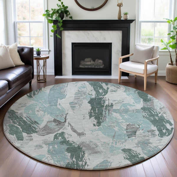 HomeRoots 8' X 8' Washable Teal, Ivory & Gray Abstract Round Rug with UV Protection for Modern Spaces 694667