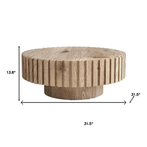 HomeRoots 32" Modern Natural Wood Round Pedestal Coffee Table – Sculptural Design for Stylish Spaces 694685