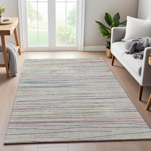 HomeRoots 9' X 12' Washable Beige Pink Purple Striped Area Rug with UV Protection for High-Traffic Spaces 694706