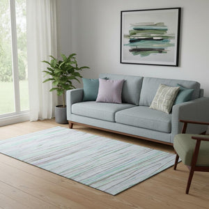 HomeRoots 5' X 8' Striped Washable Area Rug in Sky Blue, Green & Purple - UV Protected, Durable & Stylish! 694733