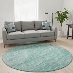 HomeRoots 8' X 8' Modern Aqua and Ivory Abstract Round Rug with UV Protection, Washable, and Stain Resistant 694770