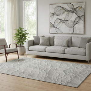 HomeRoots 5' X 8' Washable Taupe and Ivory Abstract Area Rug with UV Protection for Modern Living Spaces 694787
