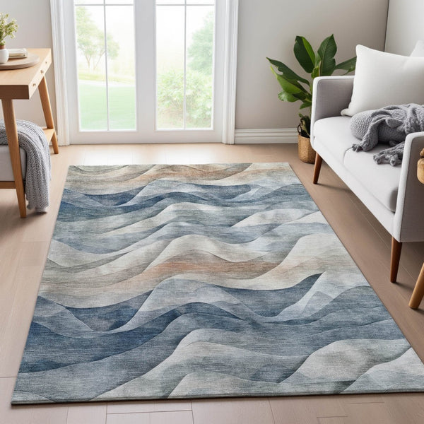 HomeRoots 10' X 14' Abstract Area Rug in Blue, Beige & Ivory - Washable, UV-Protected, Durable & Stylish! 694809