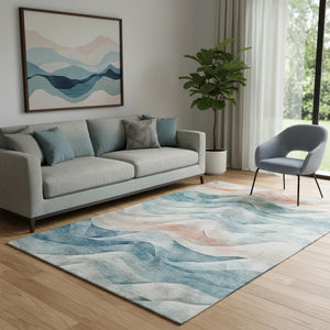 HomeRoots 5' X 8' Teal Peach Ivory Abstract Area Rug - Washable, UV-Protected, Stylish, Family-Friendly Design 694823