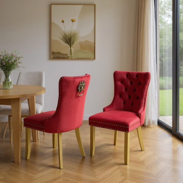 HomeRoots Set of Two Elegant Red Velvet Tufted Dining Chairs with Gold Accents for Stylish Spaces 694870