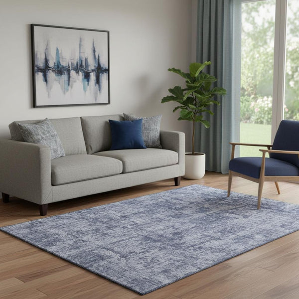 HomeRoots 5' X 8' Stylish Abstract Blue and Ivory Washable Area Rug with UV Protection for High-Traffic Spaces 695278