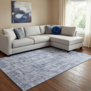 HomeRoots 8' X 10' Blue And Ivory Abstract Washable Area Rug - Durable, UV-Protected, Easy-Care for Families 695280