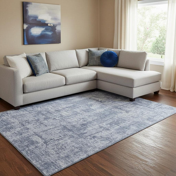 HomeRoots 8' X 10' Blue And Ivory Abstract Washable Area Rug - Durable, UV-Protected, Easy-Care for Families 695280