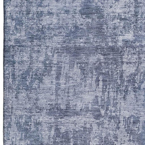 HomeRoots 8' X 10' Blue And Ivory Abstract Washable Area Rug - Durable, UV-Protected, Easy-Care for Families 695280