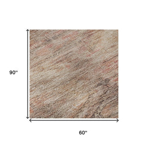 HomeRoots 5' X 8' Salmon Copper Beige Geometric Area Rug - Washable, UV Protected, Ideal for High-Traffic Spaces 695404