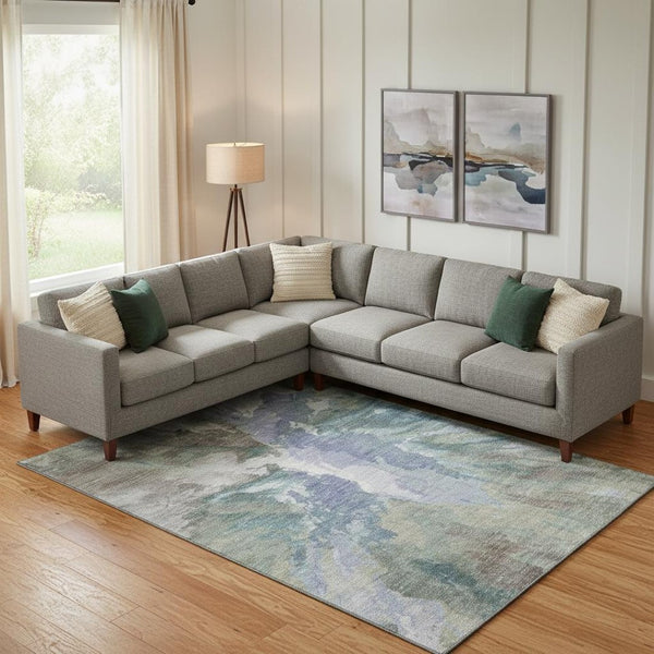 HomeRoots 9' X 12' Blue Gray and Ivory Abstract Area Rug - Durable, Stain Resistant, UV Protected for Modern Spaces 695431