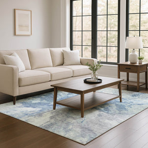HomeRoots 9' X 12' Washable Abstract Area Rug in Denim Blue & Ivory - Durable, UV-Protected & Family-Friendly! 695437
