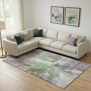 HomeRoots 10' X 14' Washable Area Rug - Bold Green, Purple & Ivory Abstract Design with UV Protection & Durability 695444