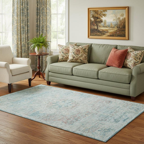 HomeRoots 5' X 8' Floral Medallion Area Rug in Sky Blue, Teal & Blush - Washable, UV Protected, Durable Design 695578
