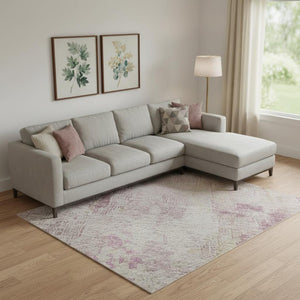 HomeRoots 9' X 12' Abstract Washable Area Rug in Pink, Peach & Ivory - UV Protected, Non-Slip, Stain Resistant 695707