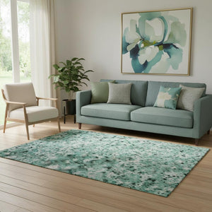 HomeRoots 5' X 8' Teal Peach Ivory Abstract Washable Area Rug – UV Protected, Durable, and Easy to Clean 695722