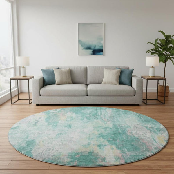HomeRoots 8' Teal Peach And Ivory Round Area Rug - Modern Abstract Design with Stain Resistance & UV Protection 695723