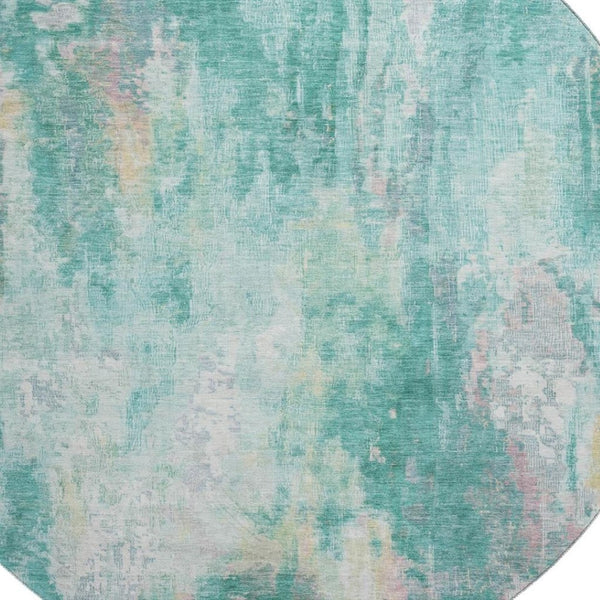 HomeRoots 8' Teal Peach And Ivory Round Area Rug - Modern Abstract Design with Stain Resistance & UV Protection 695723