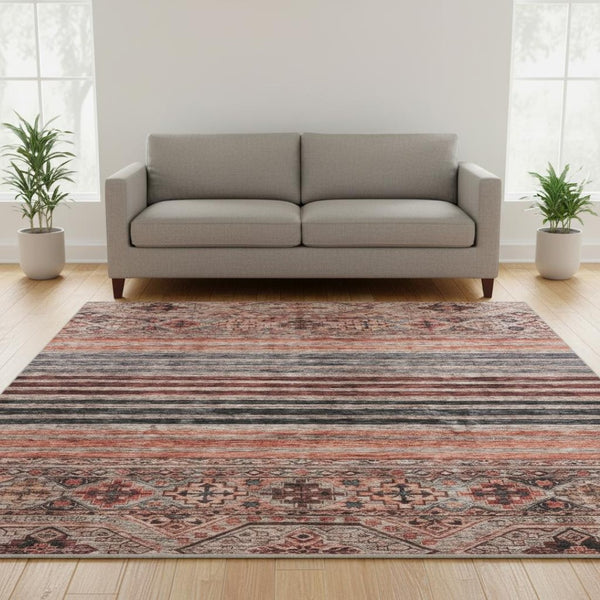 HomeRoots 8' Stylish Rust Gray and Salmon Striped Round Rug – Washable, UV-Protected, Ideal for Busy Homes 695747