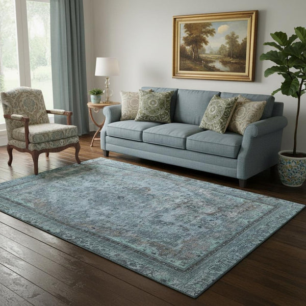 HomeRoots 5' X 8' Floral Medallion Area Rug in Blue-Gray & Silver - Washable, UV Protected for Easy Care 695890