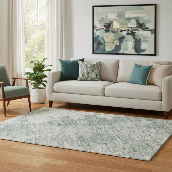 HomeRoots 5' X 8' Turquoise & Ivory Abstract Washable Area Rug with UV Protection for High-Traffic Spaces 696040