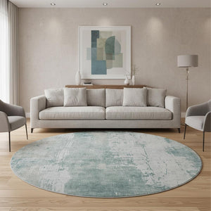 HomeRoots 8' Turquoise and Ivory Abstract Washable Round Rug - UV Protected, Stylish, Easy-Clean Design for All Spaces 696041