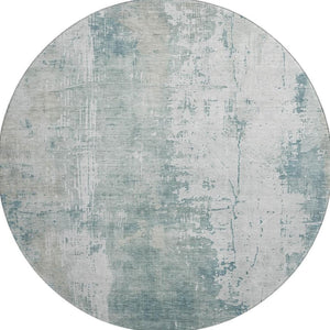 HomeRoots 8' Turquoise and Ivory Abstract Washable Round Rug - UV Protected, Stylish, Easy-Clean Design for All Spaces 696041