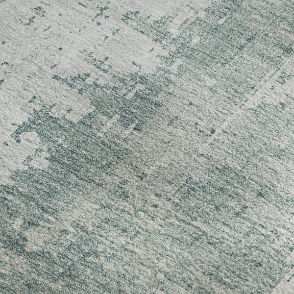 HomeRoots 8' X 10' Turquoise and Ivory Abstract Area Rug - Washable, UV-Protected, Durable for High Traffic Spaces 696042