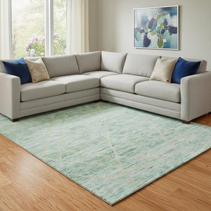 HomeRoots 8' X 10' Abstract Geometric Area Rug in Artichoke Green, Teal & Ivory - Washable & UV Protected! 696318