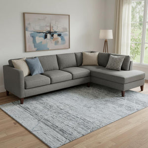 HomeRoots 9' Abstract Geometric Area Rug in Blue-Gray & Silver | Washable, UV-Protected, Non-Slip Design 696325