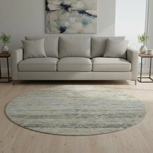 HomeRoots 8' Stylish Pewter Beige and Gold Abstract Round Rug – Washable, UV-Protected, Family-Friendly Design 696329