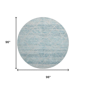 HomeRoots 8' Teal Beige and Ivory Abstract Geometric Round Rug - Washable, UV Protected & Non-Slip Design 696335