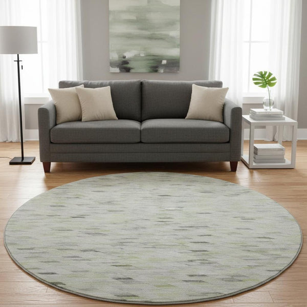 HomeRoots 8' Green Gray And Ivory Geometric Round Rug - Washable, UV Resistant, Ideal for High-Traffic Homes 696389