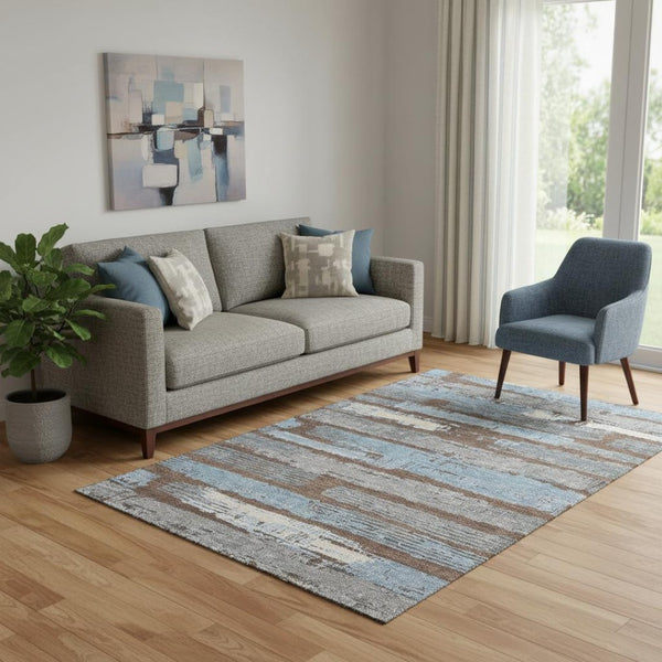 HomeRoots 5' X 8' Striped Area Rug in Chocolate, Blue & Gray - Washable, UV Protected, Perfect for High-Traffic Spaces 696484