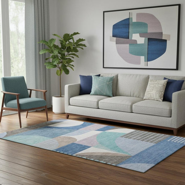 HomeRoots 5' X 8' Sky Blue Teal Ivory Geometric Rug - Durable, Washable, UV Protected for Homes with Kids & Pets 696580