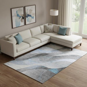 HomeRoots 9' X 12' Sky Blue Gray Silver Abstract Area Rug - Durable, Washable, UV Protected & Non-Slip Design 696607