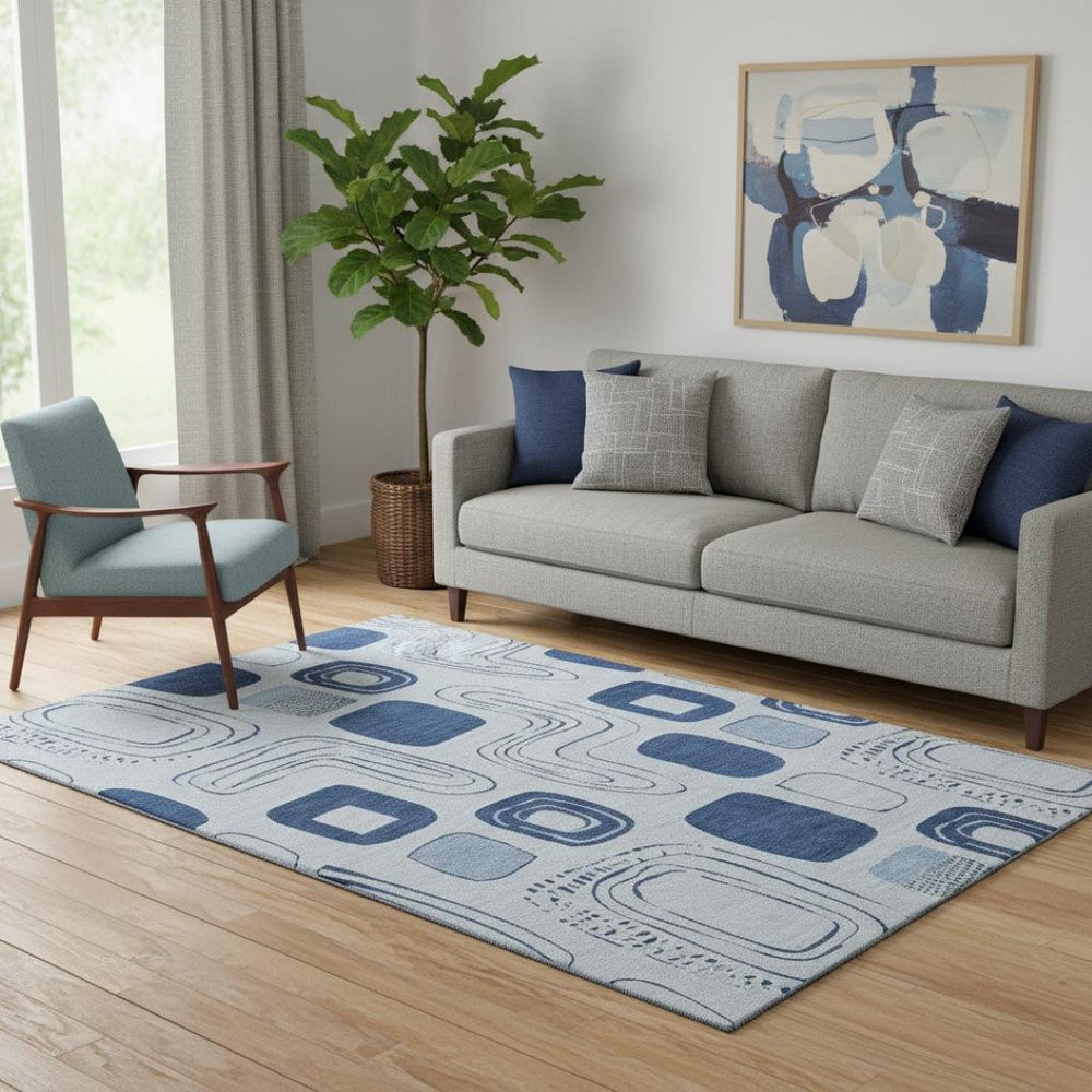 HomeRoots 5' X 8' Stylish Blue and Ivory Geometric Washable Area Rug with UV Protection for High Traffic Areas 696640