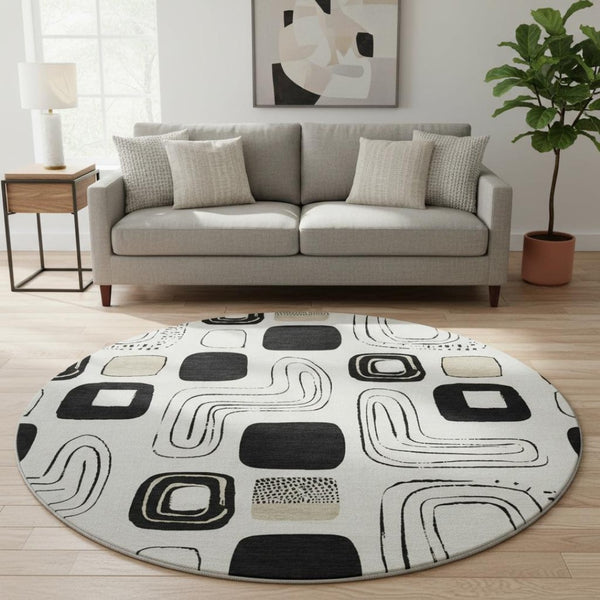 HomeRoots 8' Ivory Black Beige Geometric Washable Round Rug - Durable, Stylish & UV-Protected for Every Home 696653
