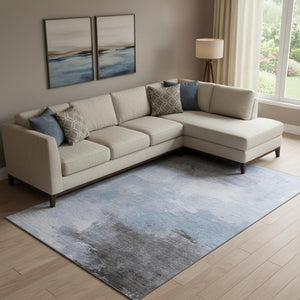 HomeRoots 9' X 12' Abstract Sky Blue Gray Silver Area Rug – Washable, UV Protected, Non-Slip for Modern Homes 696697