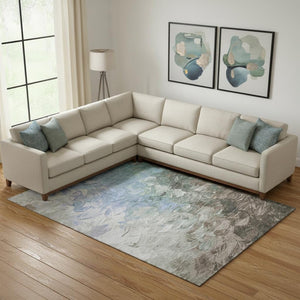 HomeRoots 9' X 12' Denim Blue Ivory Taupe Abstract Area Rug - Washable, UV Protected & Stain Resistant Beauty 696721