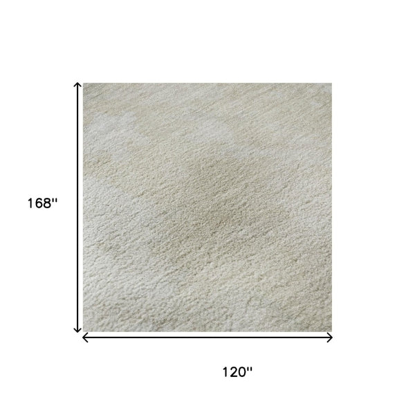 HomeRoots 10' X 14' Beige and Ivory Abstract Area Rug - Durable, Washable, UV Protected for Stylish Living Spaces 696758