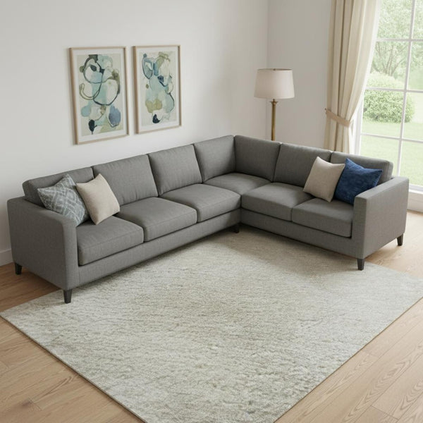 HomeRoots 10' X 14' Beige and Ivory Abstract Area Rug - Durable, Washable, UV Protected for Stylish Living Spaces 696758