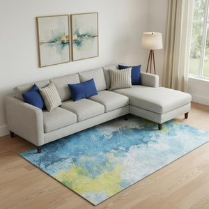 HomeRoots 9' X 12' Abstract Washable Area Rug in Blue, Yellow & Ivory - UV Protected, Non-Slip, Durable Design 696769
