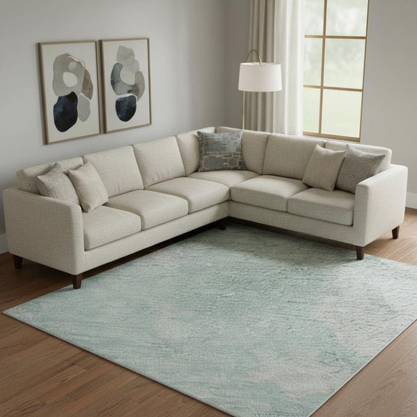 HomeRoots 9' x 12' Pale Aqua Gray Ivory Abstract Area Rug - Washable, UV Protected & Durable for High Traffic Areas 696787
