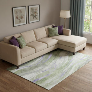 HomeRoots 10' X 14' Abstract Area Rug in Olive Green, Lavender, Ivory - Washable, Stain Resistant, UV-Protected 696806