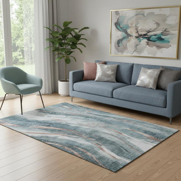 HomeRoots 5' X 8' Washable Teal Peach Ivory Abstract Area Rug – UV Protected, Stain Resistant, Durable Design 696808